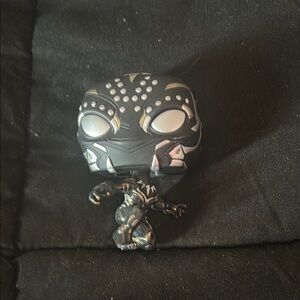 Black and Silver Collectible Figure